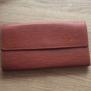 Louis Vuitton Epi Leather Sarah Wallet in Cognac.